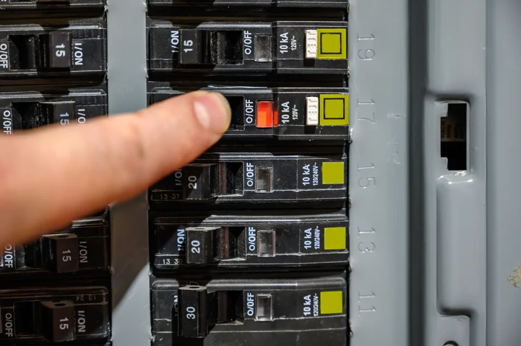 breaker being checked by electrician